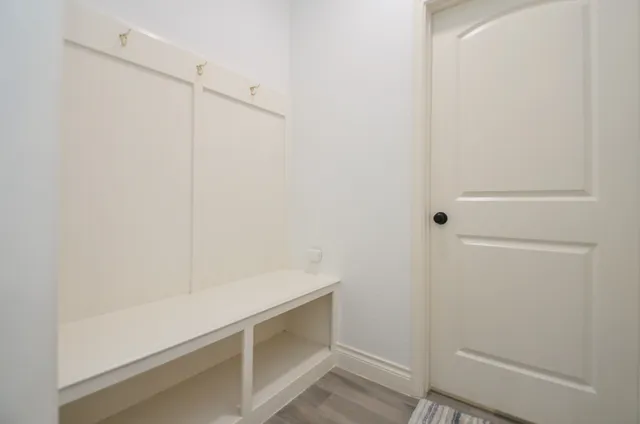 a view of a house with backyard and porch