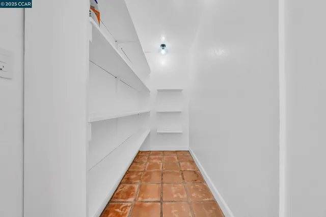a bathroom with a double vanity sink toilet mirror and shower