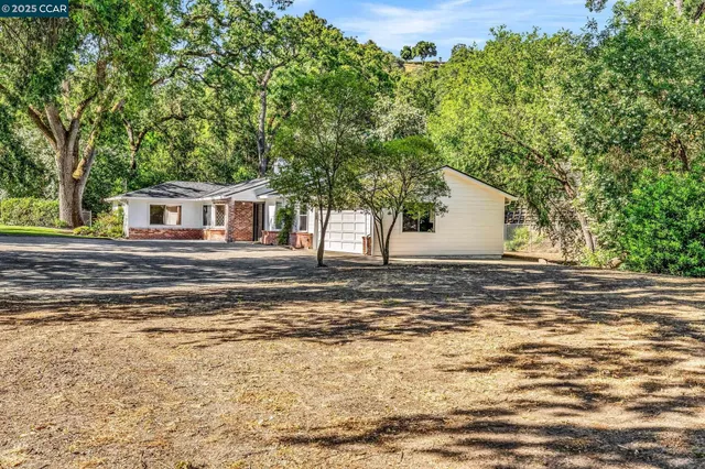 a view of empty room with windows