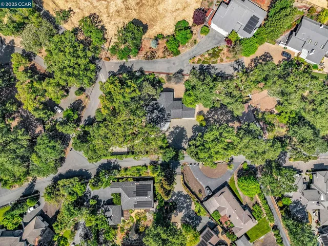 a view of a house with a street