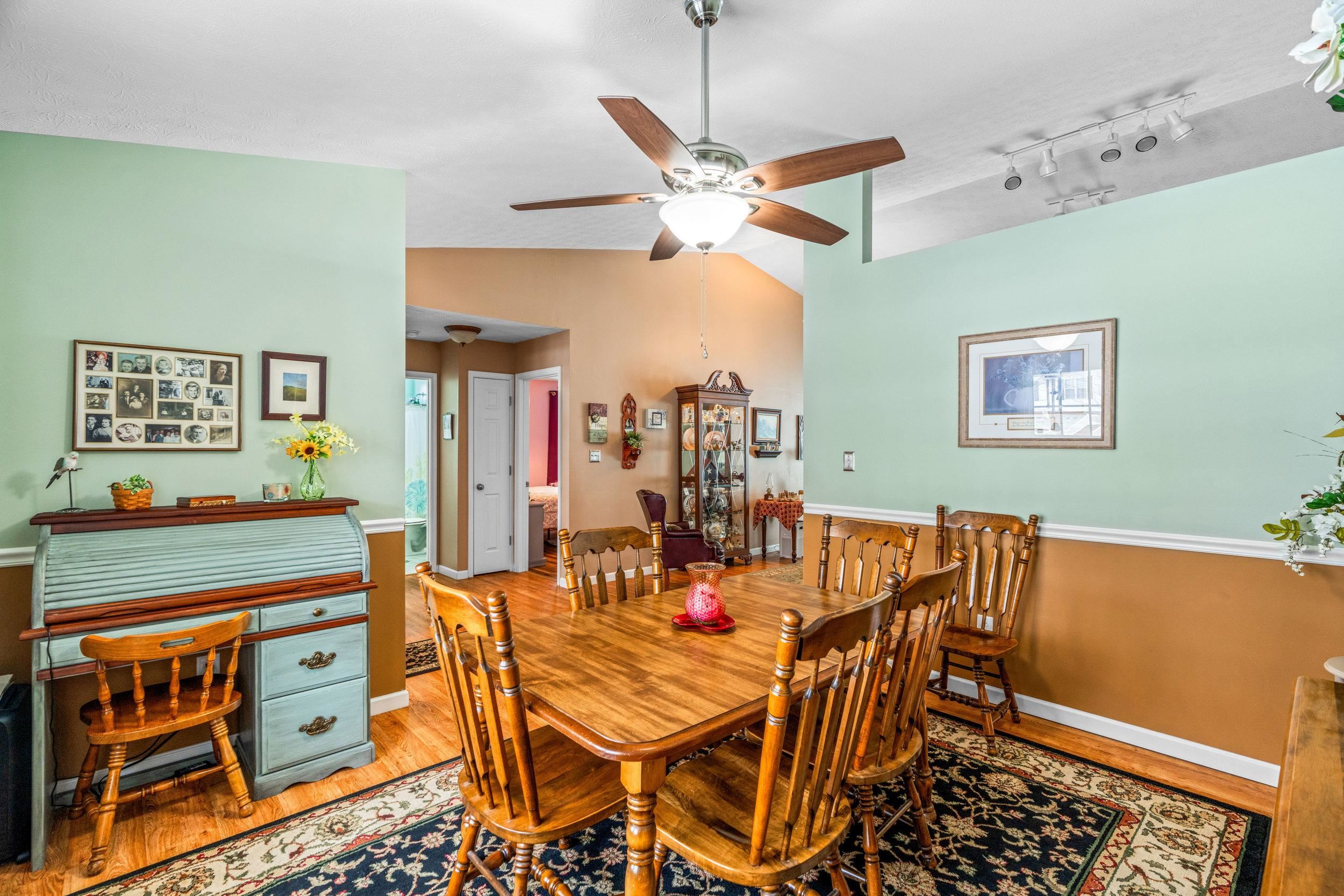 901 Ritchie Boulevard Staunton, VA 24401 - Photo 13 of 36 a dining room with furniture and a chandelier