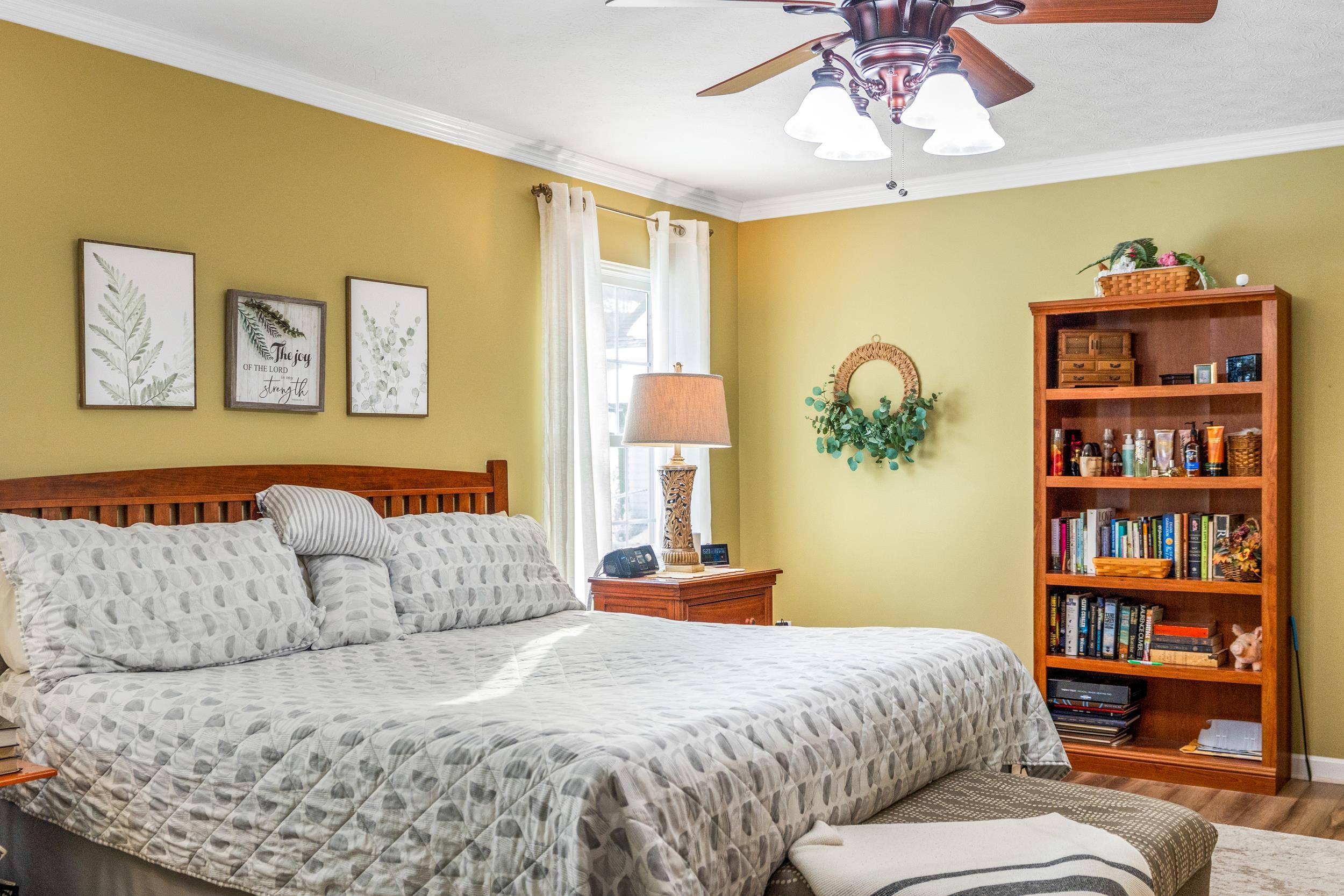 901 Ritchie Boulevard Staunton, VA 24401 - Photo 24 of 36 a bedroom with a large bed and a book shelf