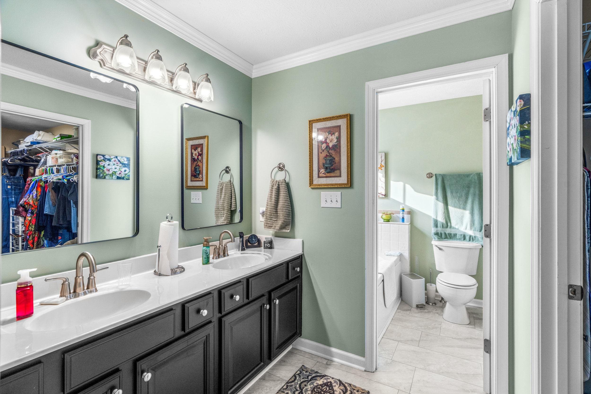 901 Ritchie Boulevard Staunton, VA 24401 - Photo 27 of 36 a bathroom with a sink vanity mirror and toilet