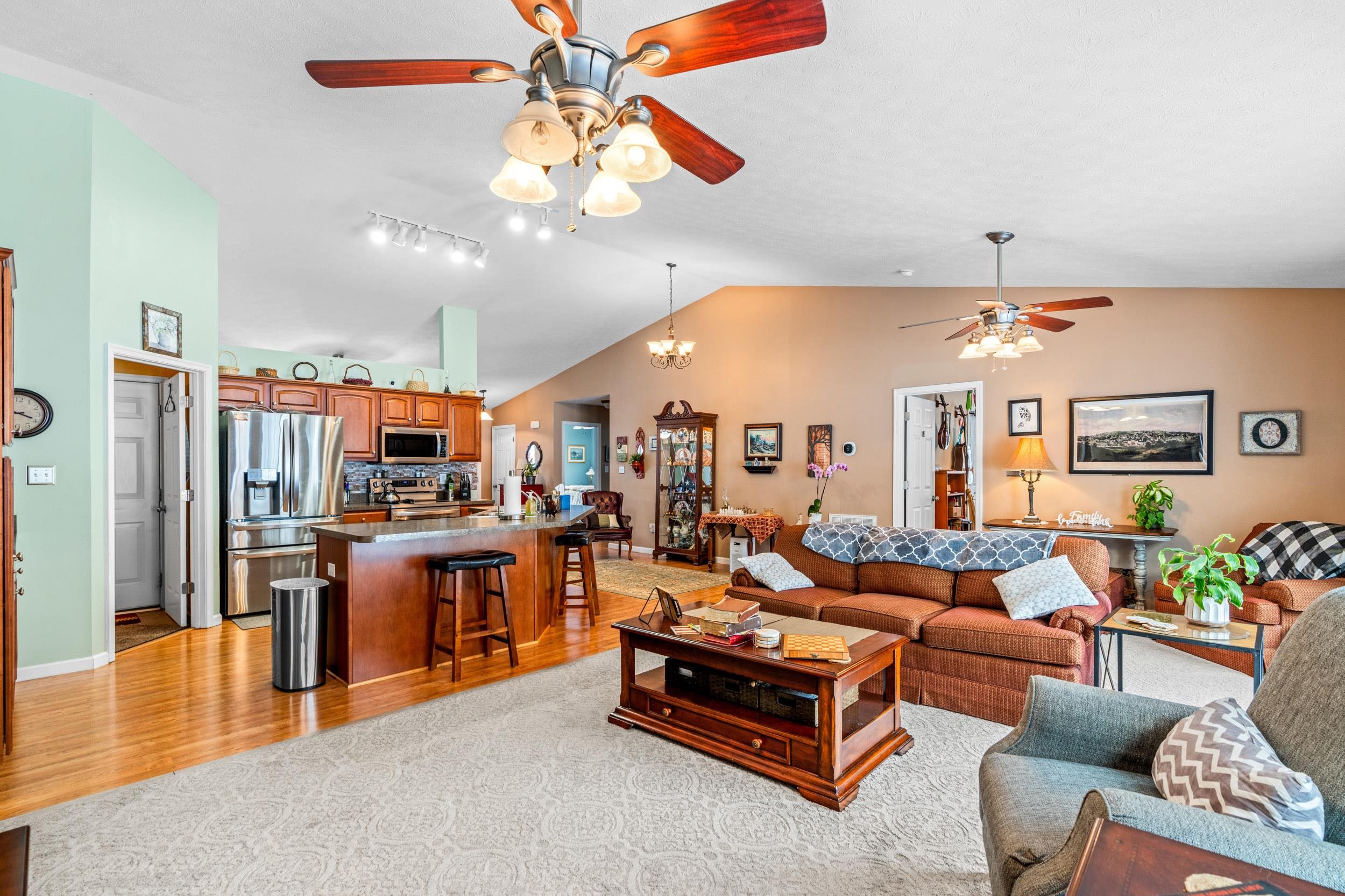 901 Ritchie Boulevard Staunton, VA 24401 - Photo 10 of 36 a living room with furniture kitchen view and a wooden floor