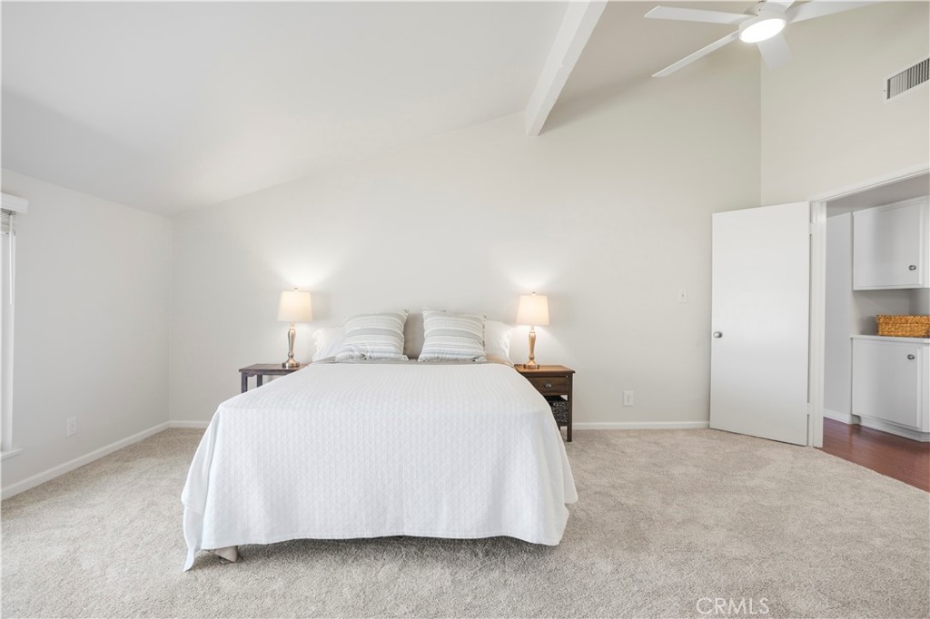 2467 Marisa Place Simi Valley, CA 93065 - Photo 13 of 29 The primary suite features vaulted ceilings, new carpet and ceiling fan.