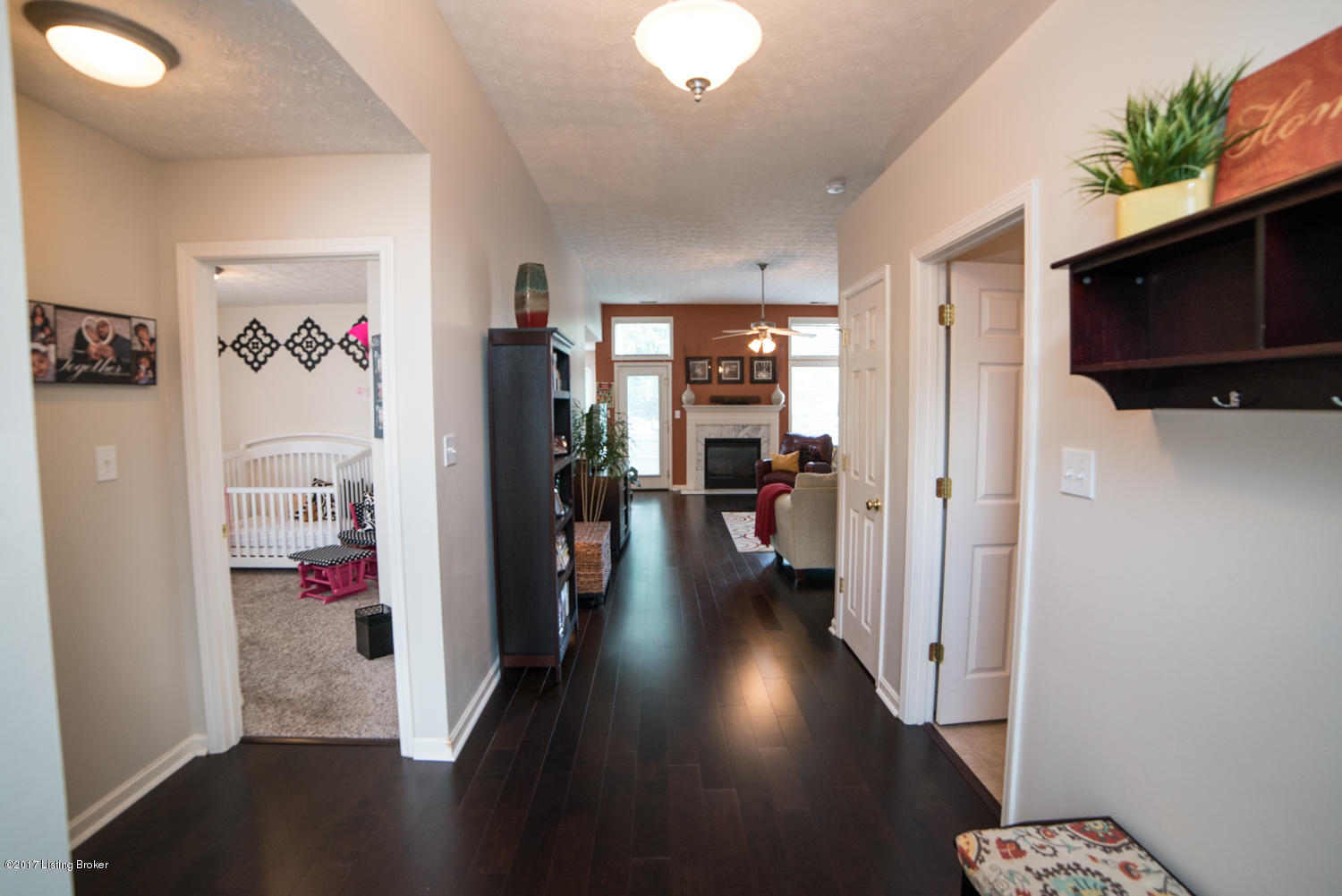17520 Curry Branch Road Louisville, KY 40245 - Photo 4 of 45 Spacious Foyer with dark hardwood flooring is a true gathering space while welcoming friends and family into your home