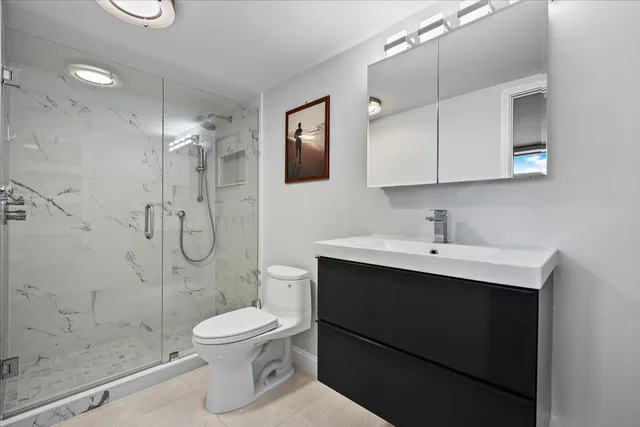 a bedroom with a workspace