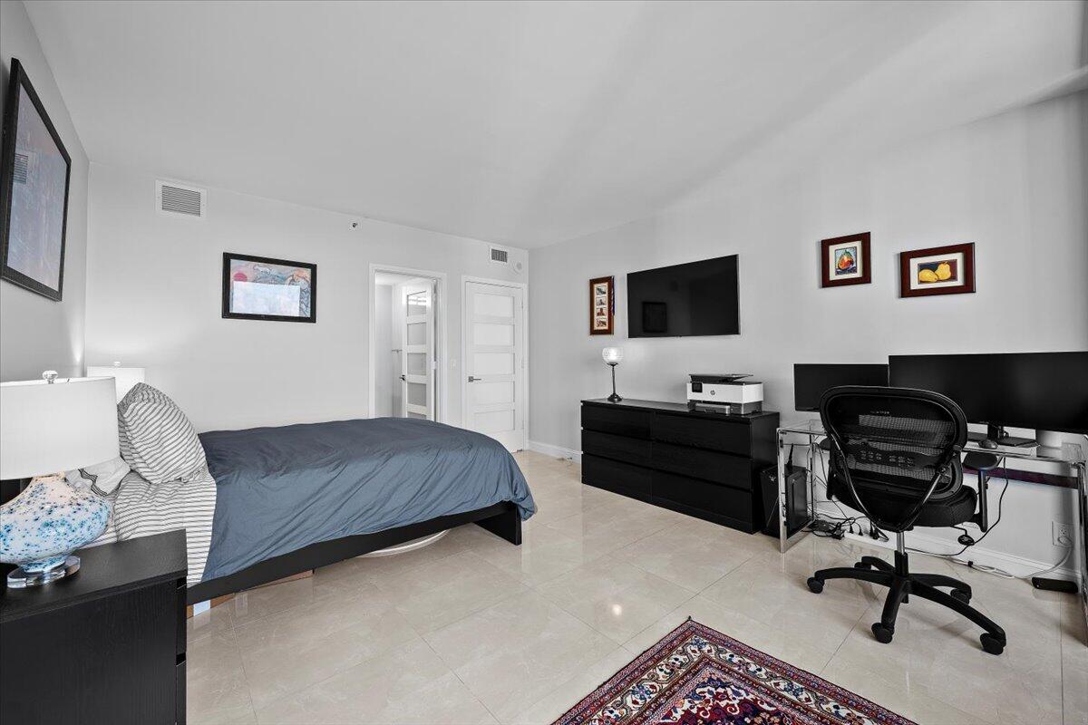4000 North Ocean Drive, Unit 2004 Singer Island, FL 33404 - Photo 22 of 54 a bedroom with a workspace