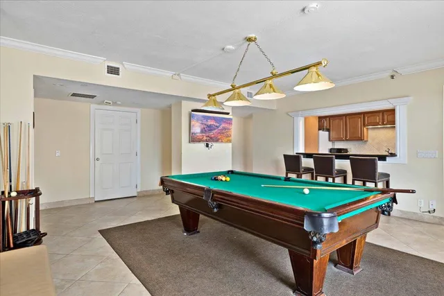 a view of swimming pool with a balcony