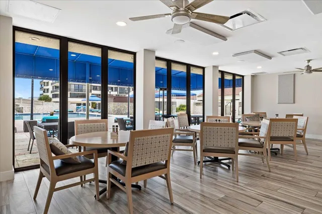 a view of swimming pool from a balcony