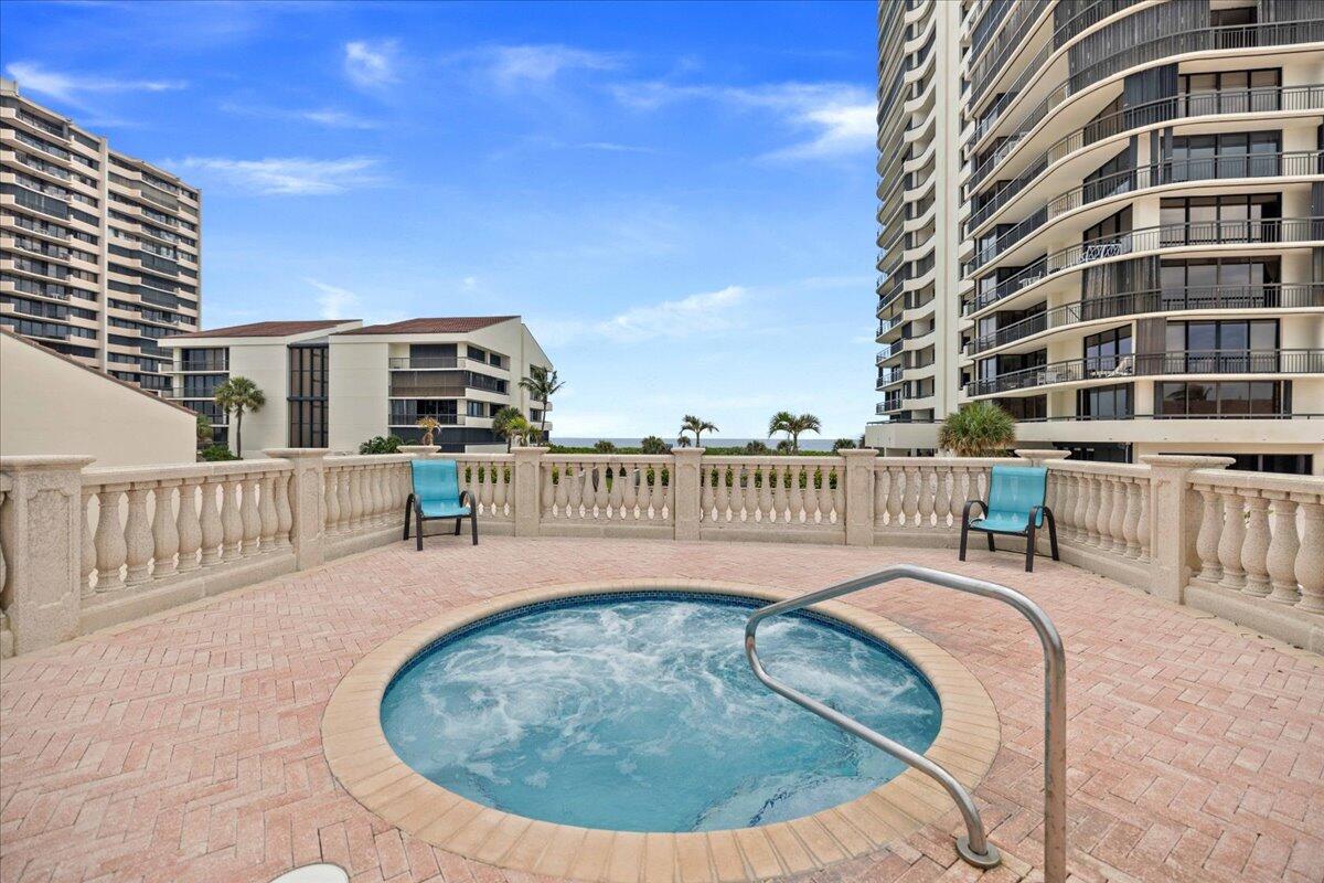 4000 North Ocean Drive, Unit 2004 Singer Island, FL 33404 - Photo 31 of 54 a view of swimming pool from a balcony