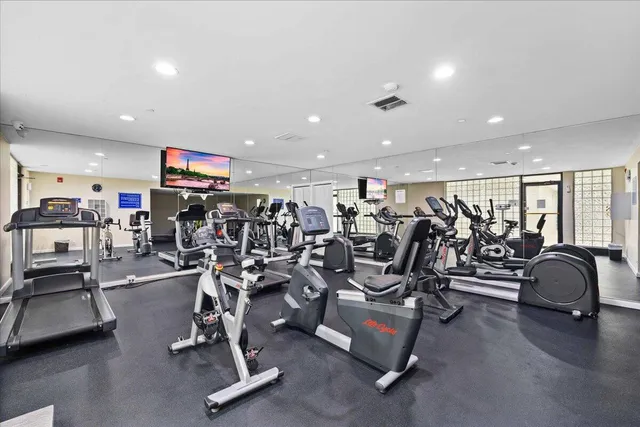 a dining room with furniture and entryway