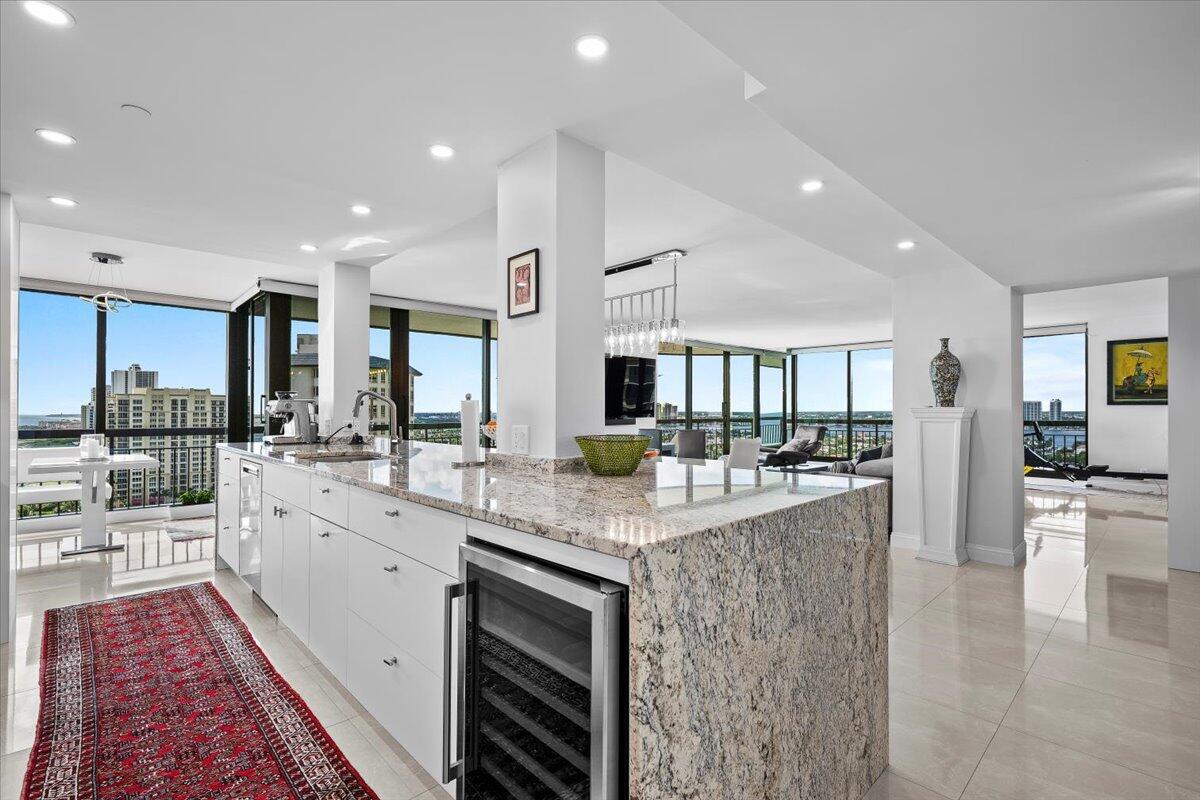 4000 North Ocean Drive, Unit 2004 Singer Island, FL 33404 - Photo 6 of 54 a large kitchen with stainless steel appliances lots of counter top space