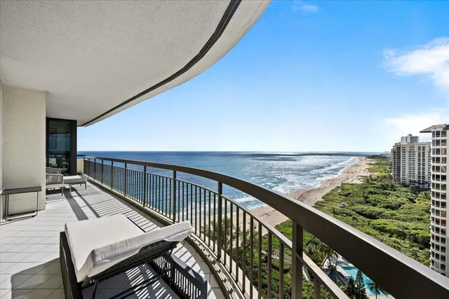 a view of balcony with furniture