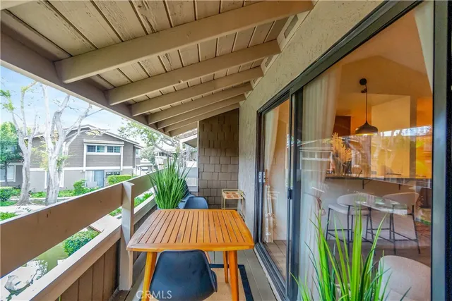 a view of balcony with patio