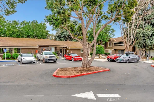 a view of street with parked cars