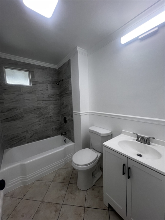 19 Reeves Street Worcester, MA 01607 - Photo 19 of 30 a bathroom with a sink a toilet and shower