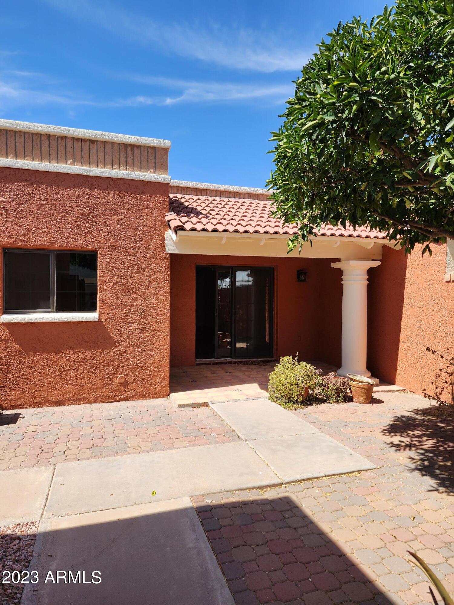 517 West Knox Road Chandler, AZ 85225 - Photo 1 of 14 a front view of a house with a yard
