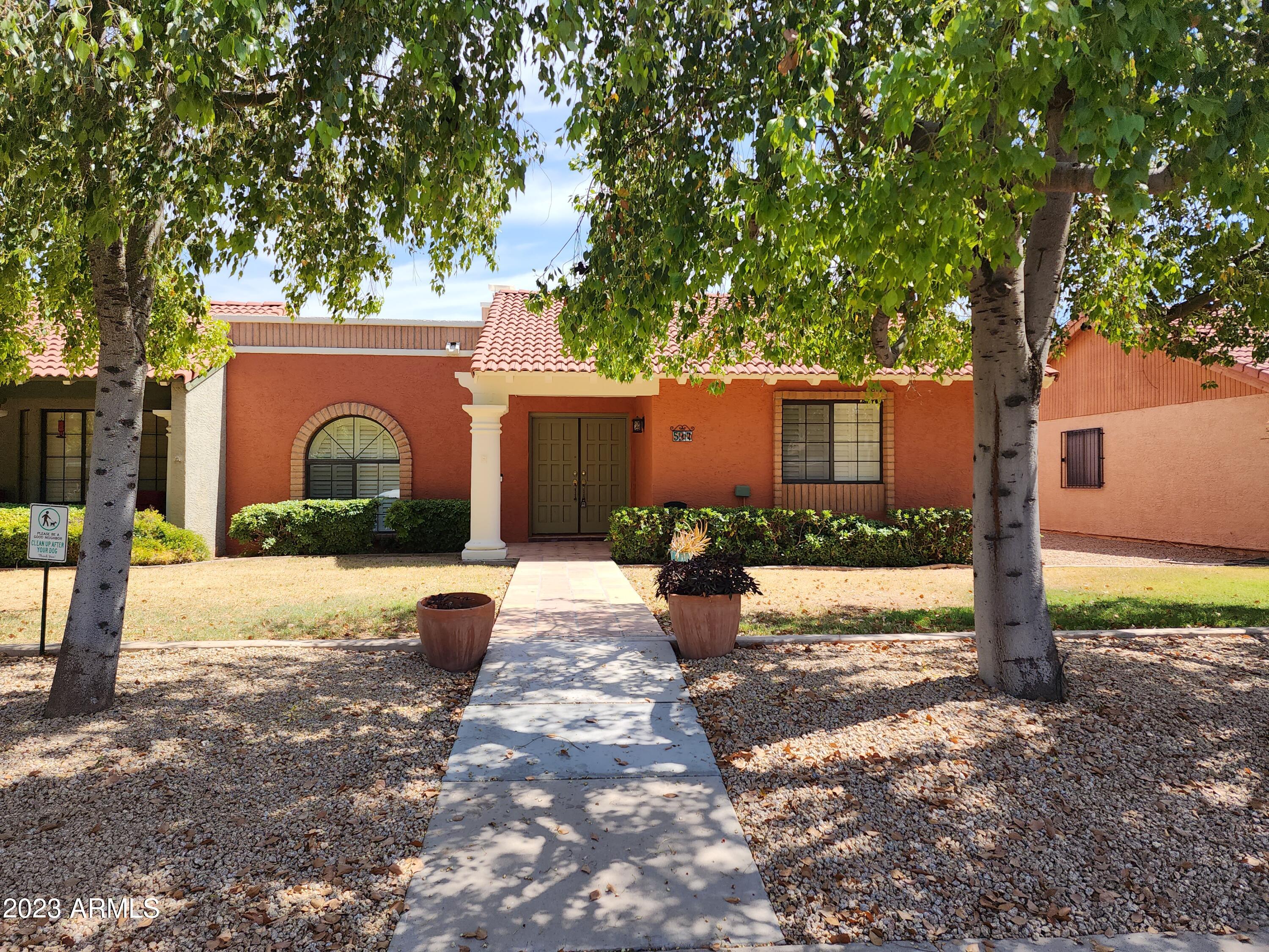 517 West Knox Road Chandler, AZ 85225 - Photo 14 of 14 a view of a house with backyard and a tree