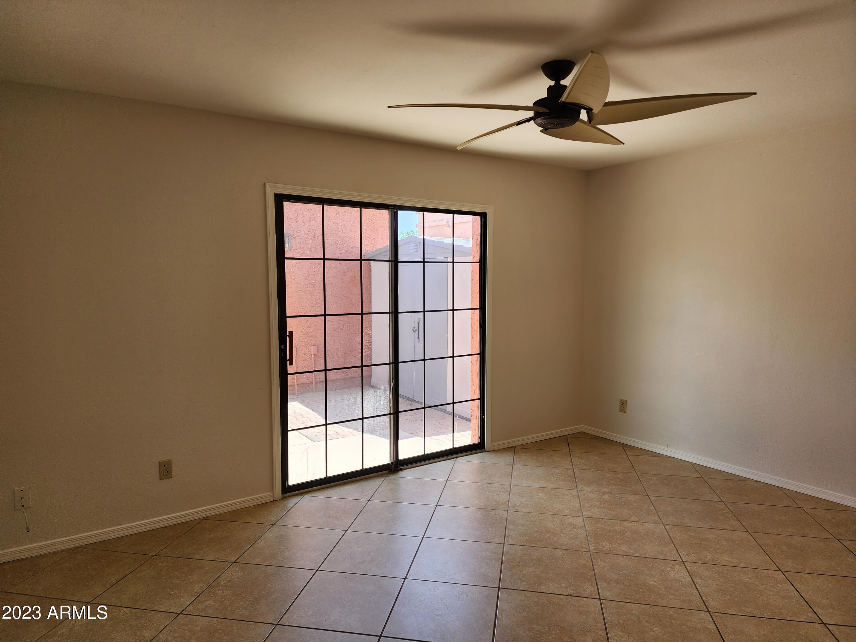 517 West Knox Road Chandler, AZ 85225 - Photo 3 of 14 a view of an empty room with a window