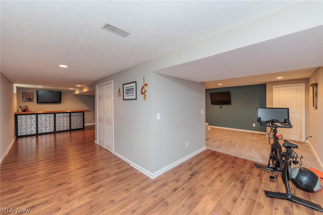 5630 Oak Point Road Lorain, OH 44053 - Photo 33 of 44 Exercise room with hardwood / wood-style flooring
