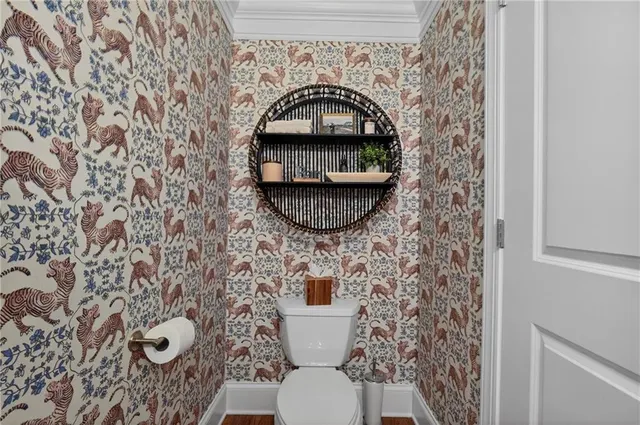 a bathroom with a toilet and a sink