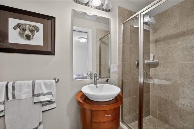 a bathroom with a sink and a mirror