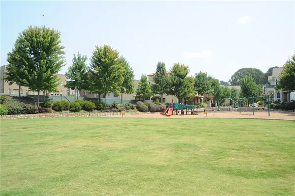 a swimming pool with wooden fence