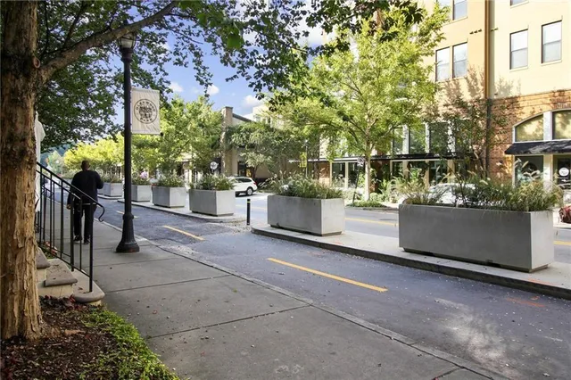 a view of a street with houses