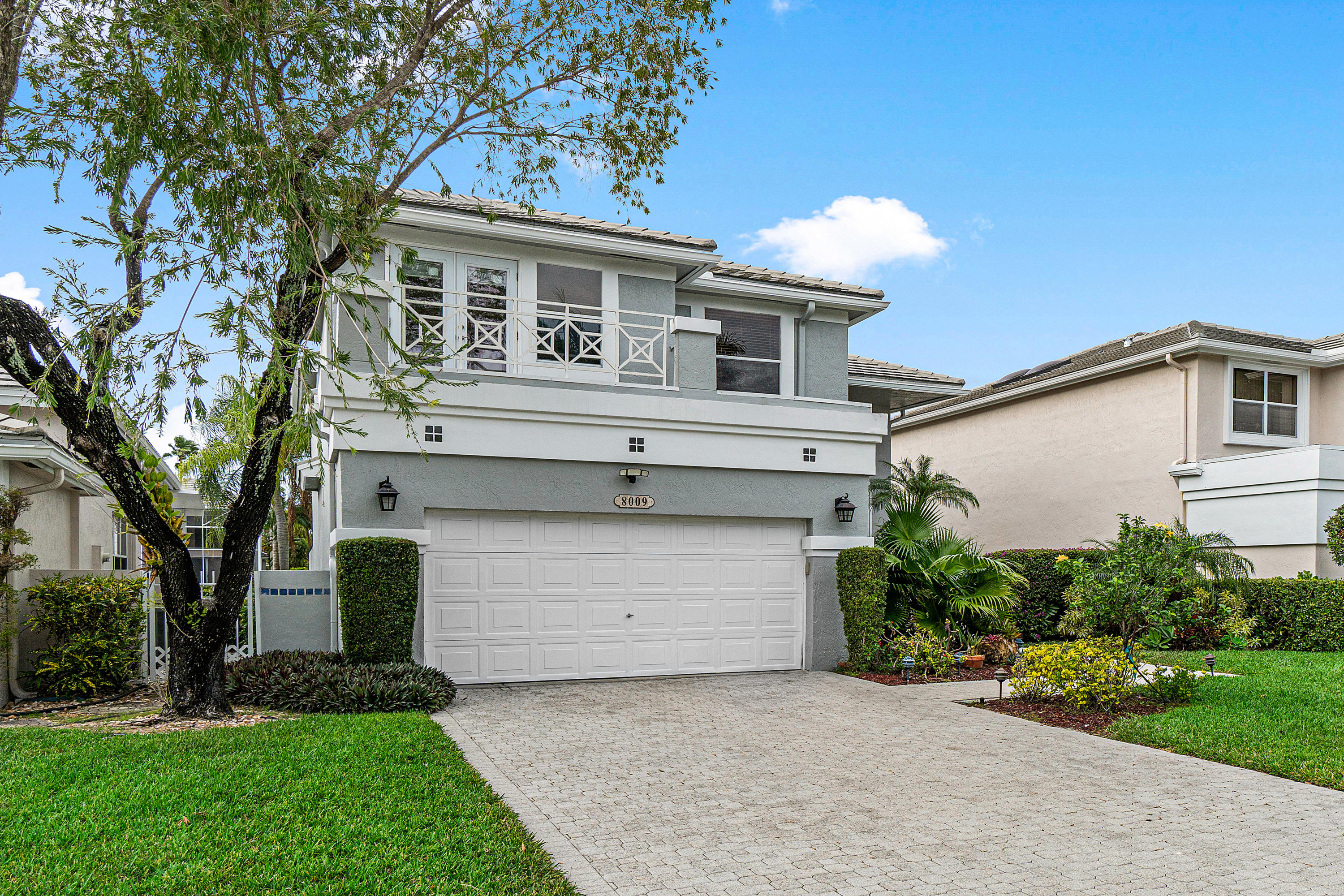 8009 Travelers Tree Drive Boca Raton, FL 33433 - Photo 1 of 44 8009-Travlers-Tree-Dr-Boca-Raton-33433