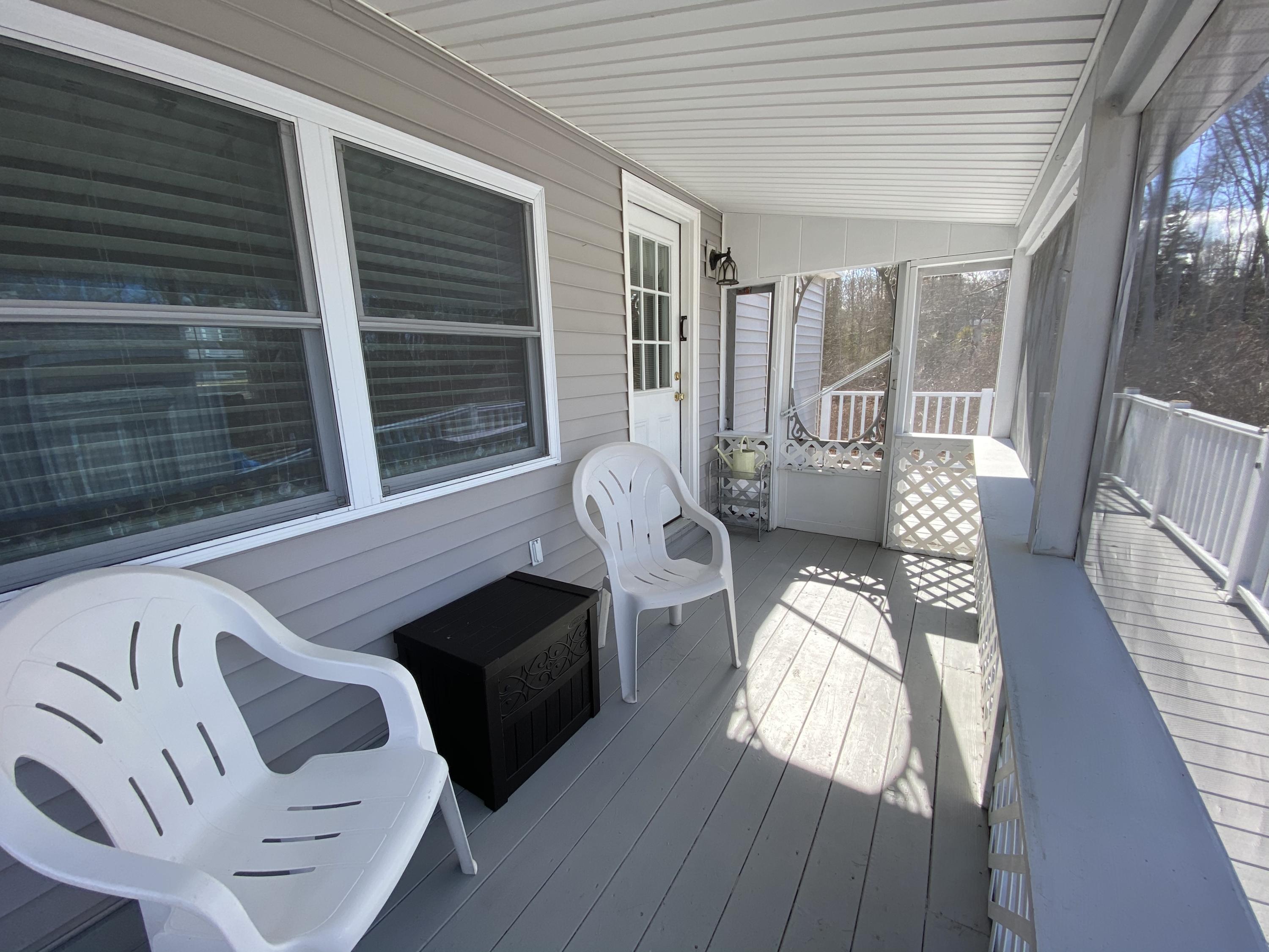 12 Wave Crest Lane, Unit C2 Boothbay, ME 04544 - Photo 20 of 31 Screened porch_Photo Feb 28, 11 40 50 AM