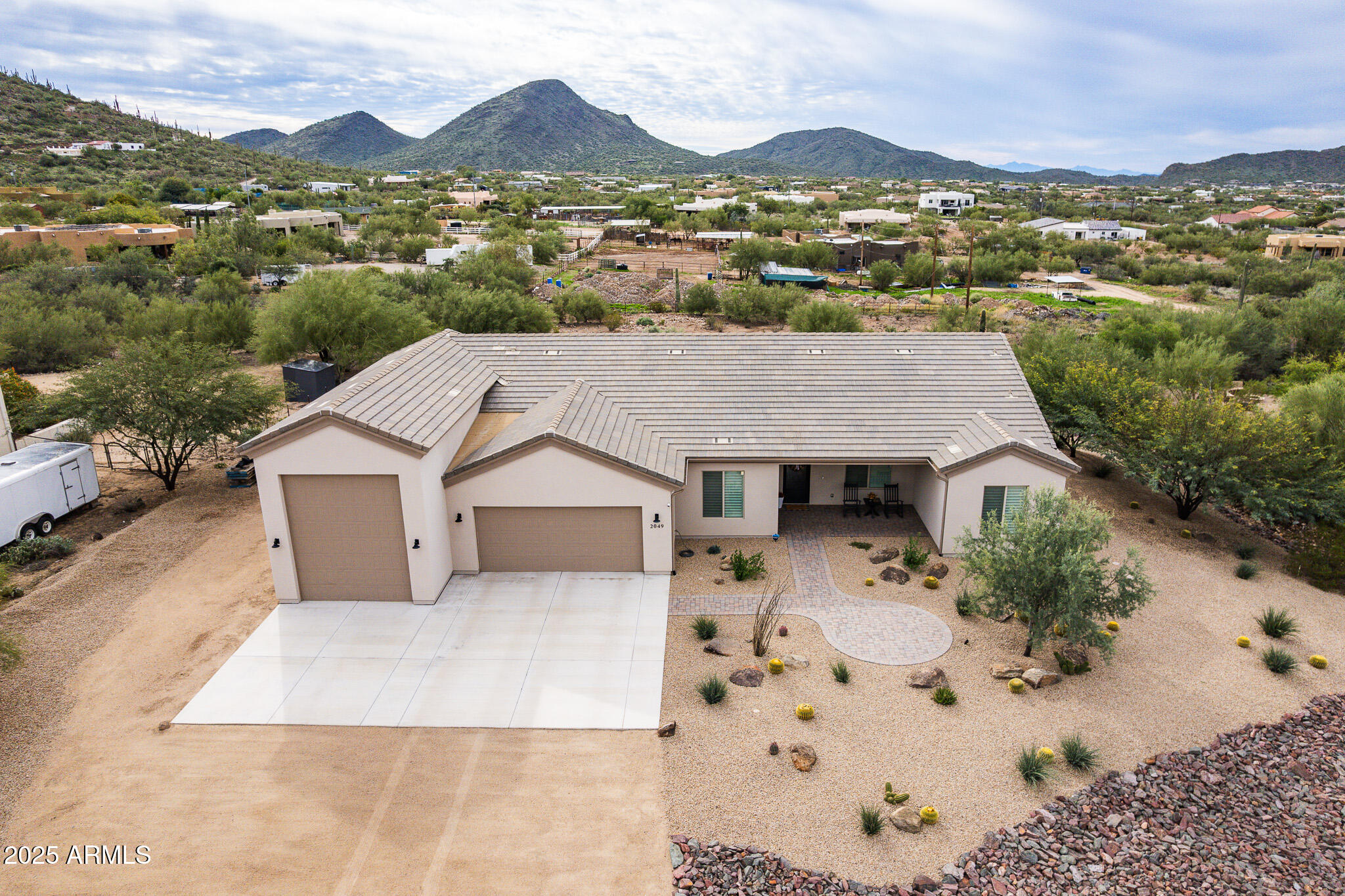 an aerial view of residential house with an outdoor space