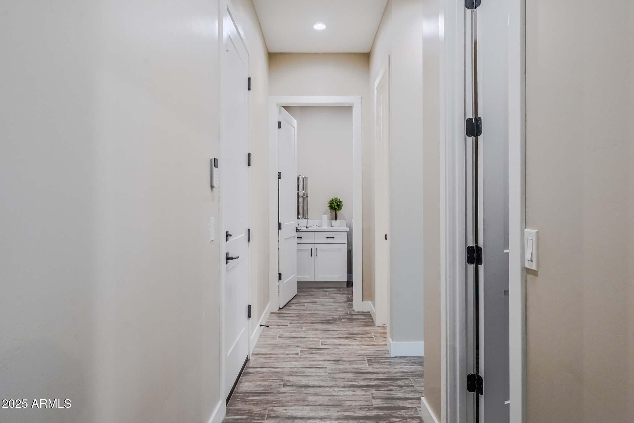 2049 East Gaffney Road New River, AZ 85087 - Photo 21 of 77 a bathroom with a sink and a mirror