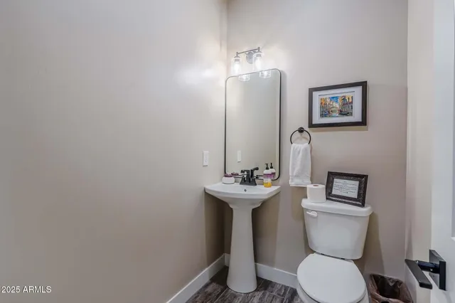 a spacious bedroom with a bed and a window