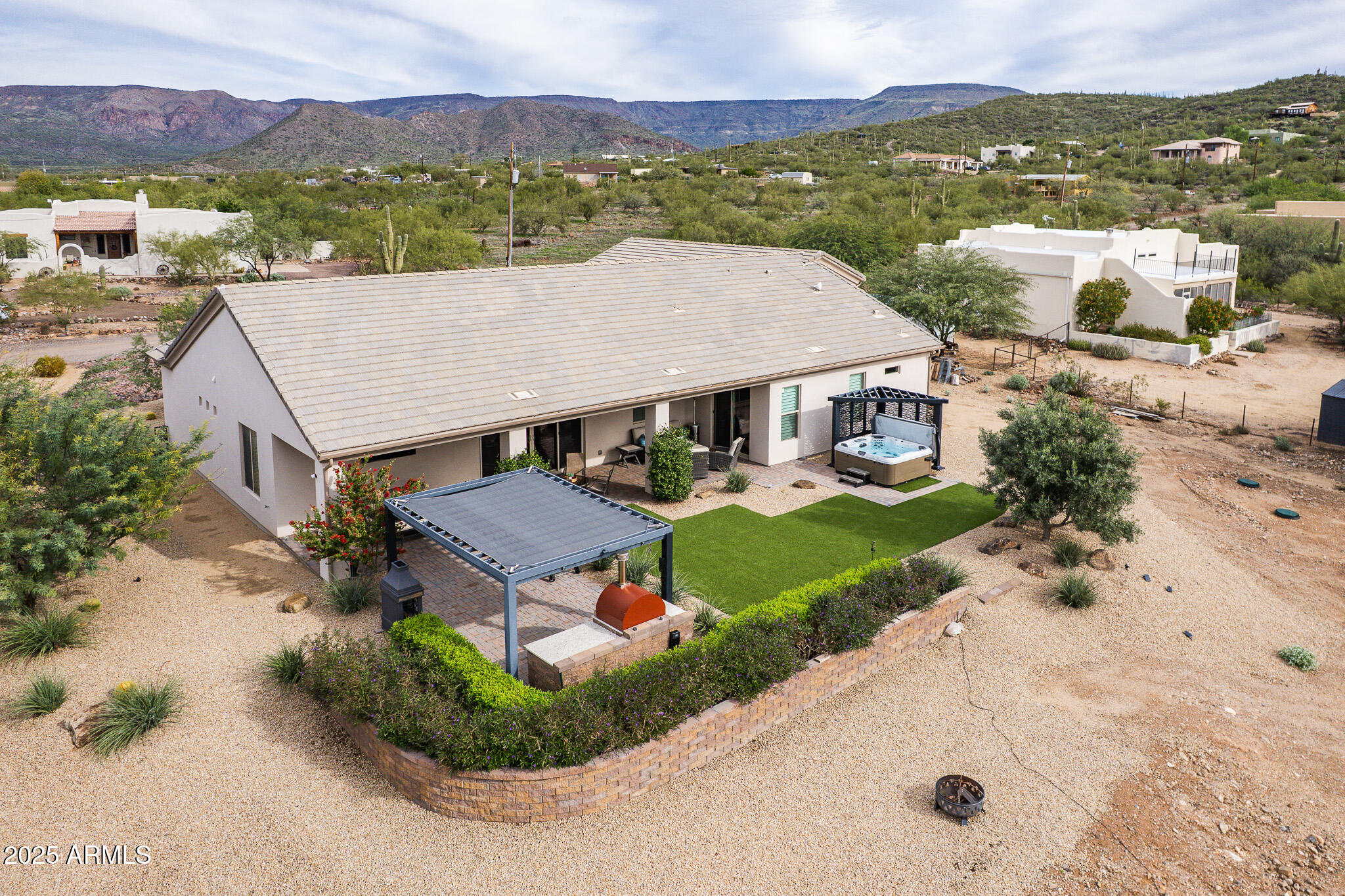 2049 East Gaffney Road New River, AZ 85087 - Photo 39 of 77 an aerial view of a house with a garden