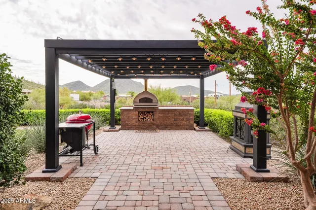 a front view of a house with a patio