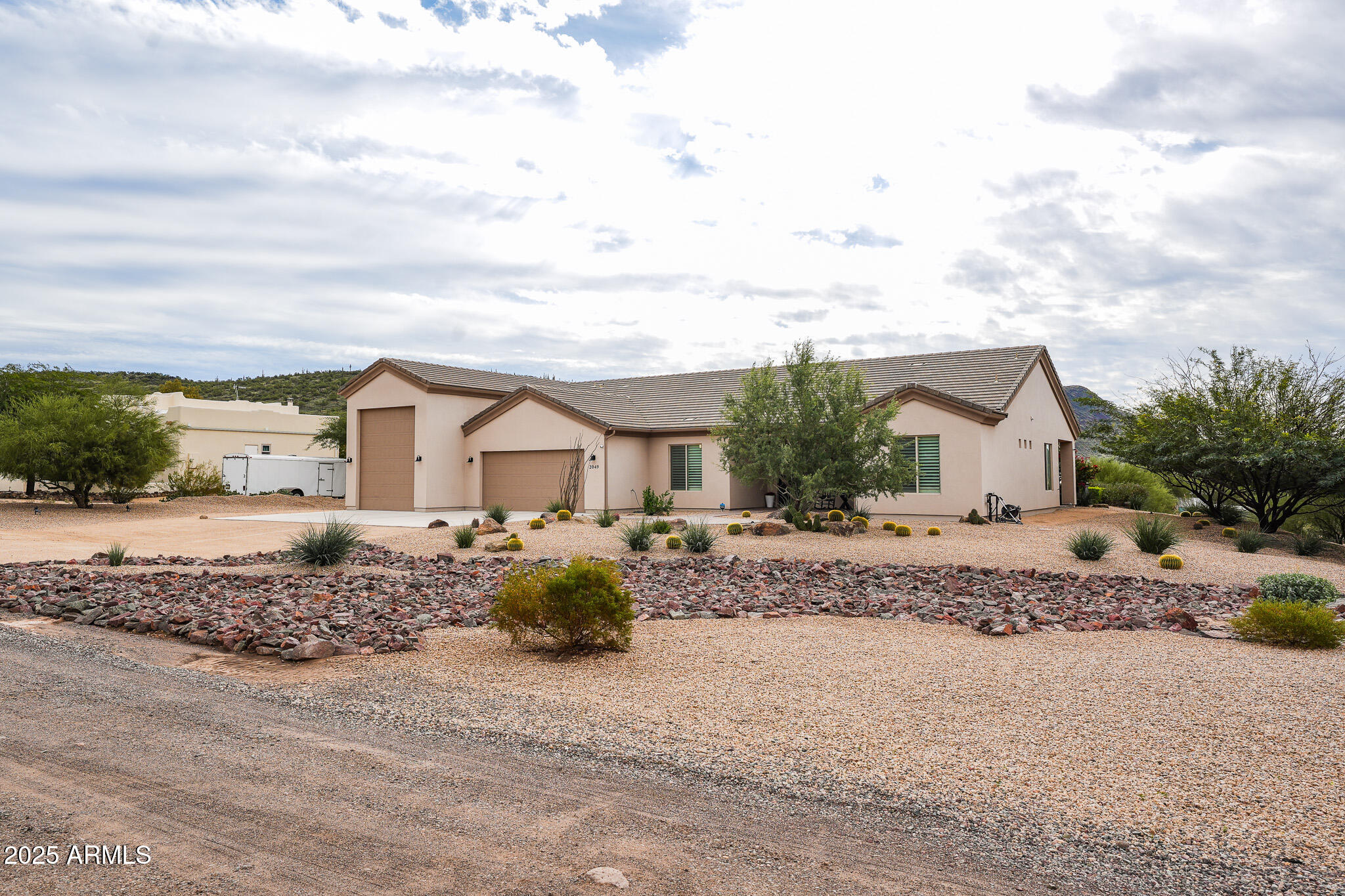 2049 East Gaffney Road New River, AZ 85087 - Photo 70 of 77 a front view of a house with a yard