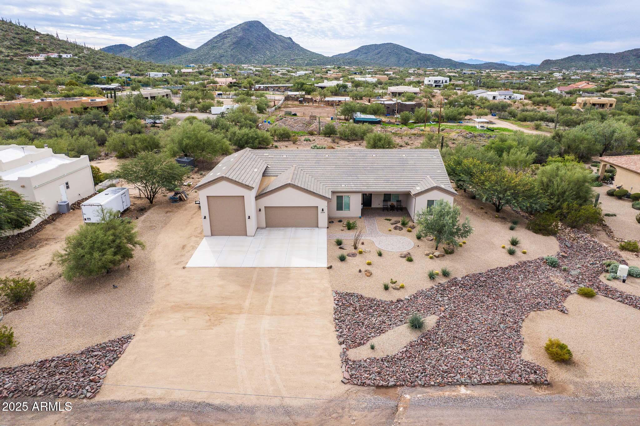 2049 East Gaffney Road New River, AZ 85087 - Photo 76 of 77 an aerial view of residential houses with outdoor space