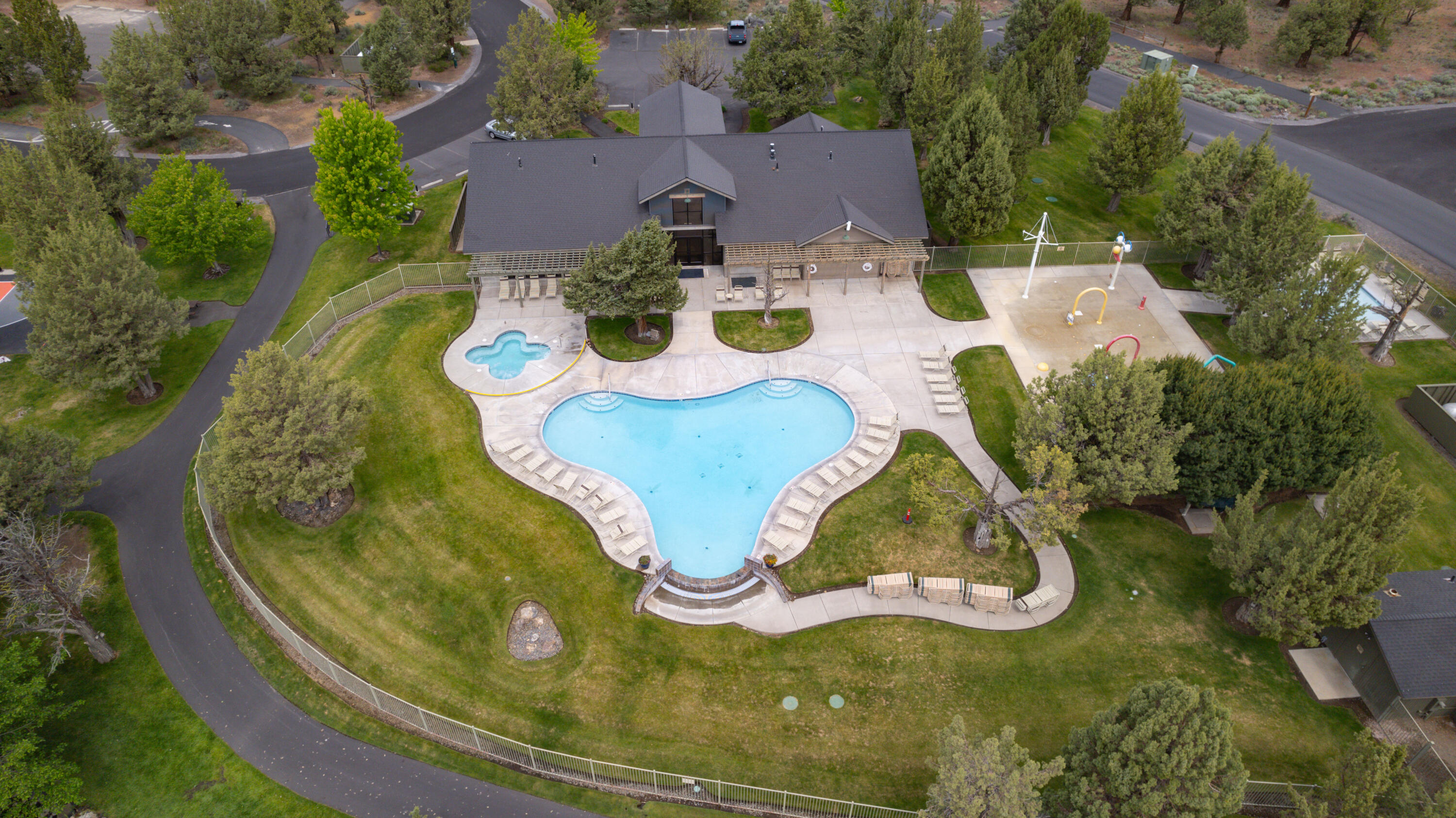 9009 Merlin Drive Redmond, OR 97756 - Photo 86 of 98 an aerial view of a house with swimming pool patio and outdoor seating