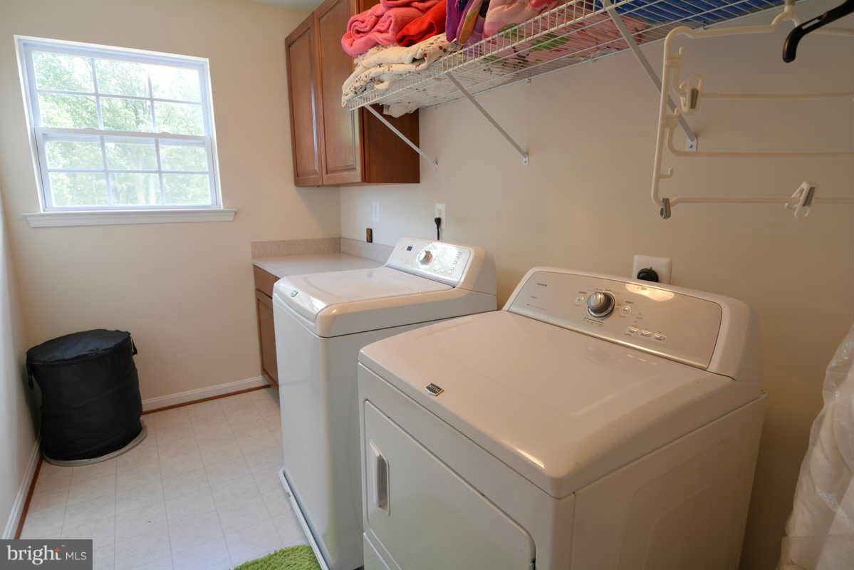 2016 Baythorne Road Prince Frederick, MD 20678 - Photo 25 of 30 a utility room with dryer and washer