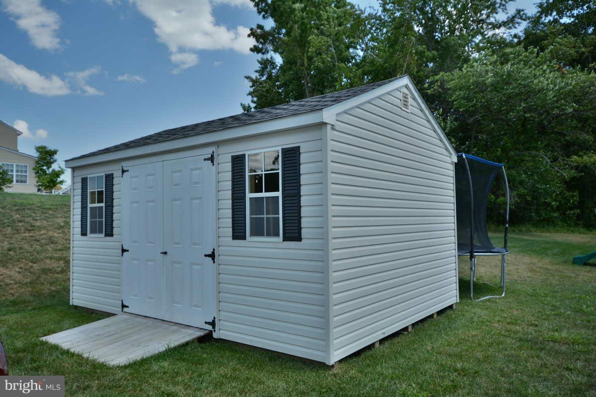 2016 Baythorne Road Prince Frederick, MD 20678 - Photo 30 of 30 a view of a house with a yard