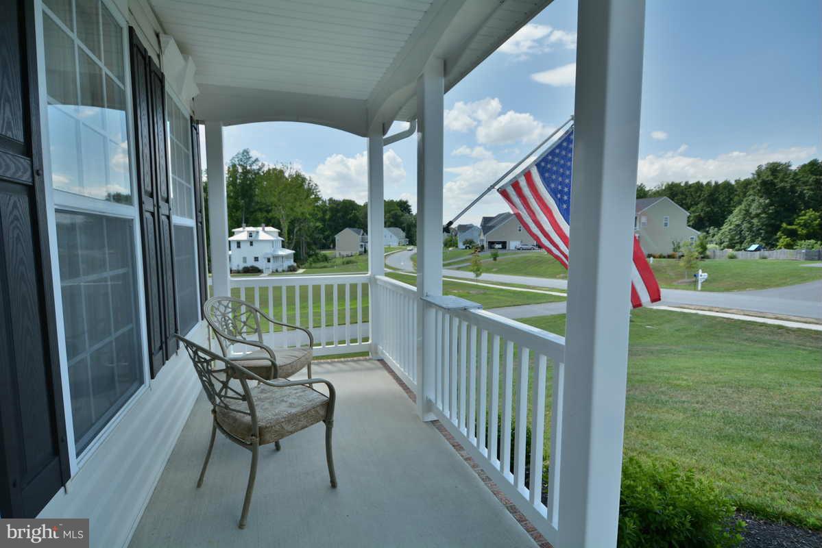 2016 Baythorne Road Prince Frederick, MD 20678 - Photo 4 of 30 a view of a two chair and table in the balcony