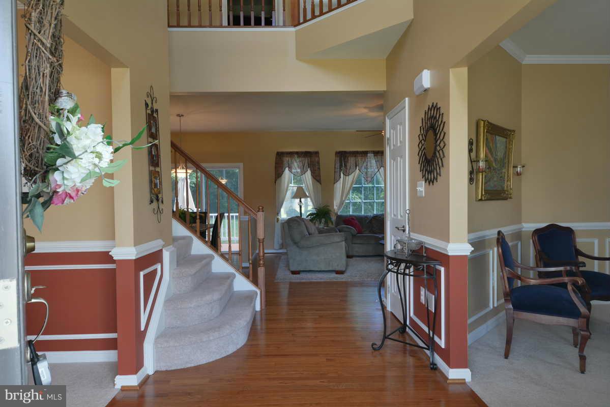 2016 Baythorne Road Prince Frederick, MD 20678 - Photo 8 of 30 a view of entryway and hall with wooden floor