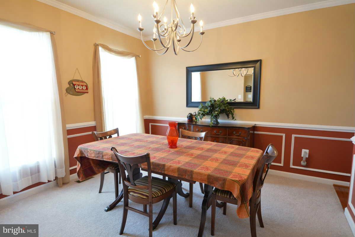 2016 Baythorne Road Prince Frederick, MD 20678 - Photo 9 of 30 a view of a dining room with furniture and window