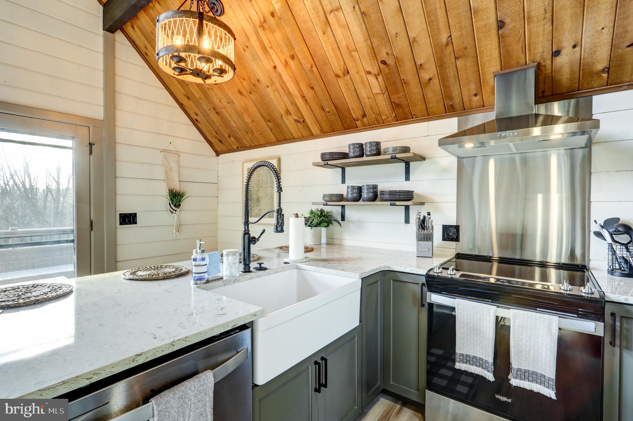 120 Brompton Road Hummelstown, PA 17036 - Photo 25 of 55 a kitchen with stainless steel appliances a sink stove and cabinets