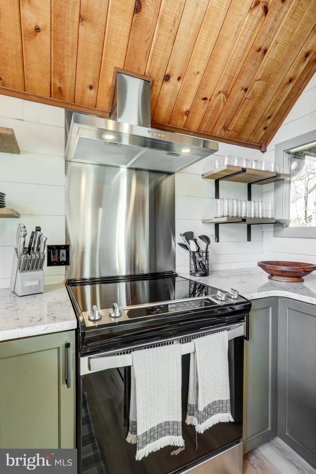 120 Brompton Road Hummelstown, PA 17036 - Photo 29 of 55 a kitchen with stainless steel appliances granite countertop a sink a stove cabinets and wooden floor