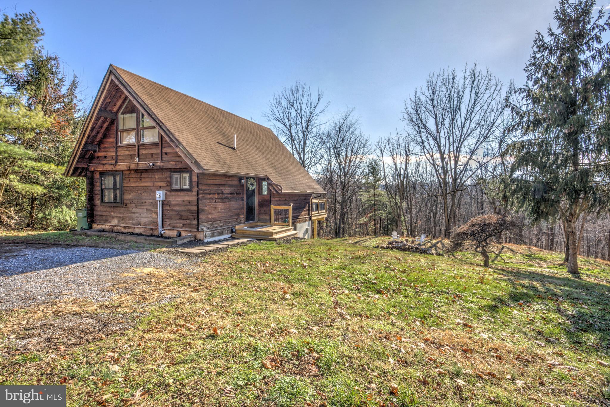 120 Brompton Road Hummelstown, PA 17036 - Photo 3 of 55 a view of a house with a yard and large tree