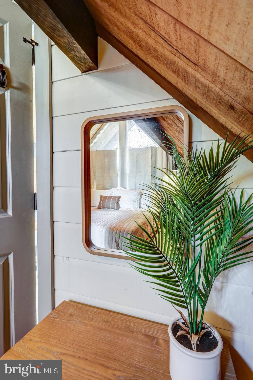 120 Brompton Road Hummelstown, PA 17036 - Photo 43 of 55 a vase of flowers sitting on a floor next to a window