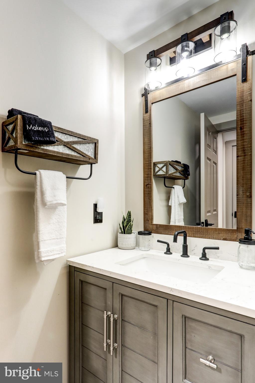 120 Brompton Road Hummelstown, PA 17036 - Photo 51 of 55 a bathroom with a sink and a mirror