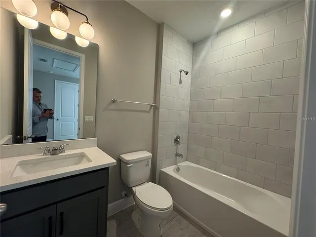 an empty room with a empty space and a window